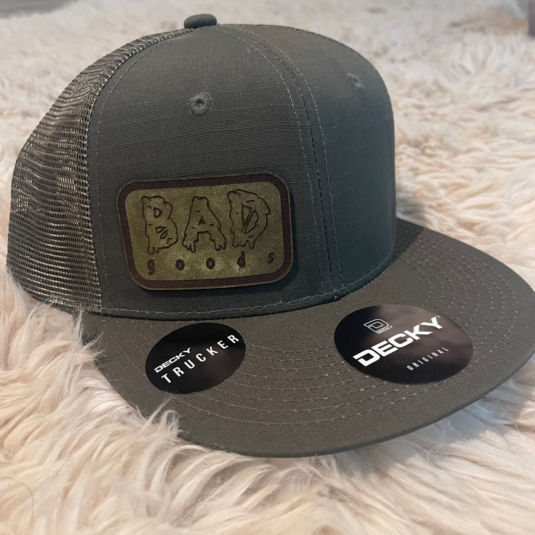 #906 - Dark Grey Trucker Hat with Green Leather Patch